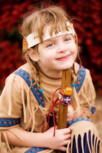 Braid your hair and accessorize your costume with a beaded headband.