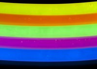 A yellow, orange, green, purple and blue glow stick.