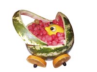Use a lemon as the baby in your watermelon baby carriage.