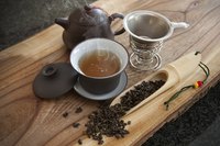 Catechins and caffeine in oolong tea boost burning of calories and fat.
