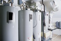 Heat trap nipples thread into a water heater's ports.
