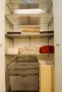Multiple shelves create more room for storage within a small closet space.