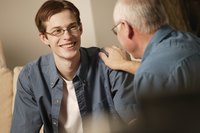 Young adult employee having a conversation with his boss