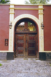 Remove scratches from stained wood doors to make them look newer.