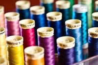 You don't need to unthread your serger to change knives.