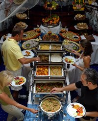 Caterers use chafers to display food and keep it warm.