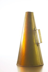 Make a simple megaphone using posterboard.