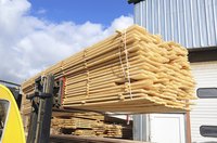Cut wood being moved at sawmill