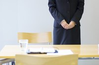 A woman is waiting for an interview.