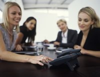 Businesswomen on a teleconference call.
