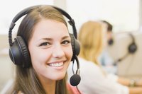 A customer service rep talking to a customer through a head set.