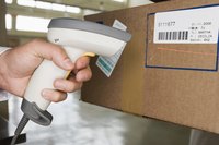 Hand of person scanning label