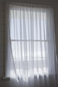 Sheer curtains can impart a romantic ambiance.