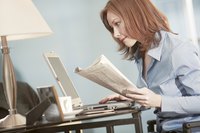 Young adult woman working on her laptop