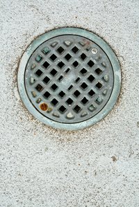 Drains in concrete slab floors are common in basements.