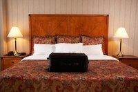 Keep your luggage off the beds in hotel rooms so you do not get bed bugs.