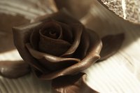Work quickly with a stiff ganache to pipe roses that set up and hold their shape.