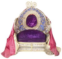 Get carried away with over-the-top regal-looking fabrics to turn an ordinary chair into a throne.