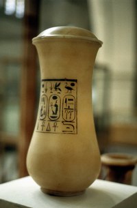 Create handmade canopic jars using basic craft supplies.