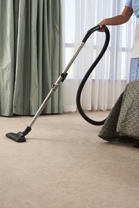 New carpets can produce fuzz, which must be removed.