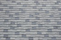 It's hard work, but mosy DIYers can install a roof for less.
