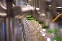 How many bottles are filled versus volume of soda lost?