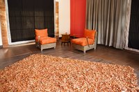 A large modern rug in a loft apartment.