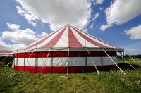 Large red and white striped tent.