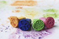 Rubber stamps and alcohol-based inks may be used to decorate your Shrinky Dinks before baking.