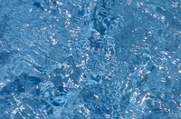 Calculate the rate of flow of water for a swimming pool to size the pool's pump properly.