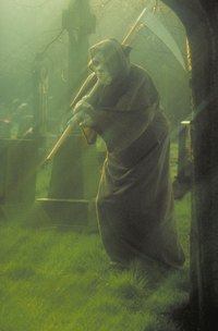 A grave fence adds atmosphere to a Halloween graveyard or haunted house.