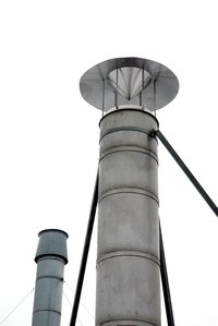 The cap for a chimney does more than keep out water.