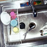 The standard drain is directly below the faucet, whereas an off-set drain is shifted to one side.