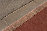 Curbs keep people from driving or walking on your lawn.