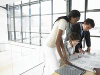 A business team going over a project together.