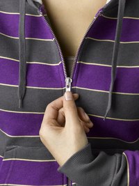 Beauty products such as hairspray and nail polish can keep a zipper up.