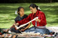 Navajo Indians make woolen rugs by hand after spinning the yarn and dyeing it.