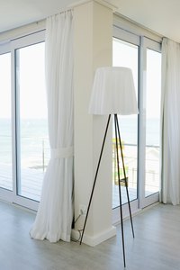 Properly installed traverse rods lead to attractive window treatments.