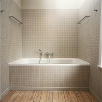 Access panels often are located in rooms adjacent to the bathroom.