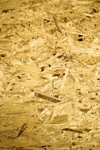 Chipboard is preferable to plywood for shelving, as it is resistant to bowing.