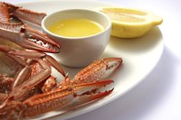 Pour the butter into a small dish to serve next to the crab.