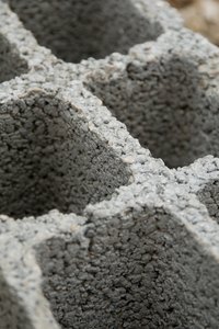 Mold can grow down in the holes of cinder blocks.