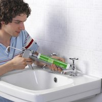 Creating a waterproof seal around sink components can fight bacteria growth.