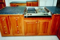 Add a protective polyurethane coating to wood cabinets.
