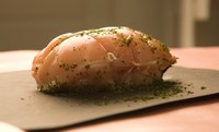 Inject the loin before cooking it to lock in the flavors and the meat's juices.