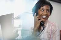A businesswoman is talking on the phone.
