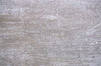 Whitewashing lends character without hiding grain.