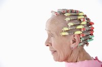 Traditional perm rods roll the hair over itself, while a spiral rod will keep hair separate in a corkscrew pattern.