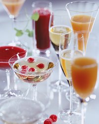 Jazz up inexpensive champagnes with flavored liquors and fruit juices.