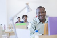 A businessman is working at his desk.